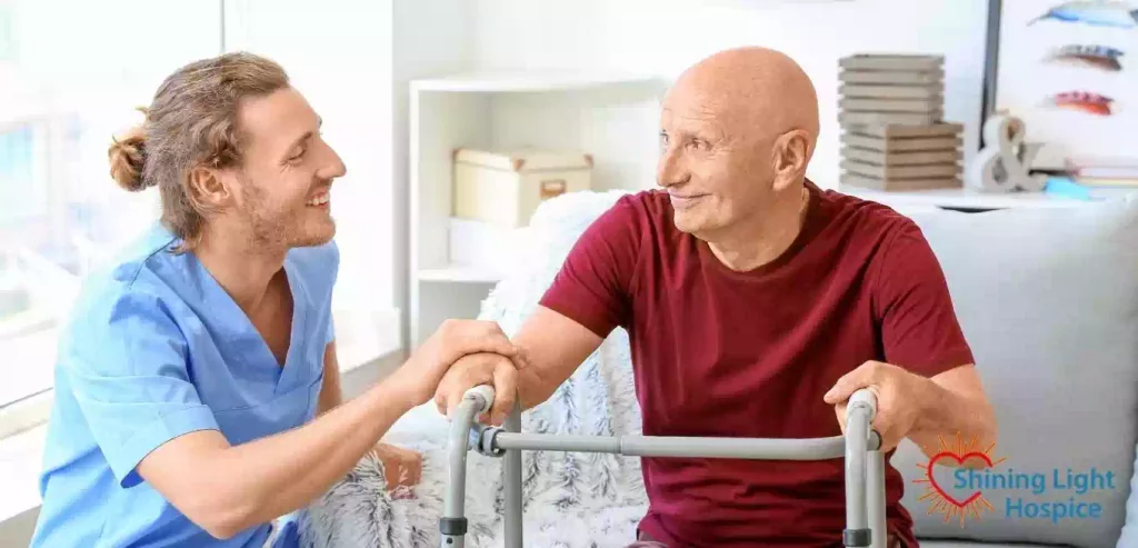 Elderly Man with Caregiver in Nursing Home Hospice Medical Equipment