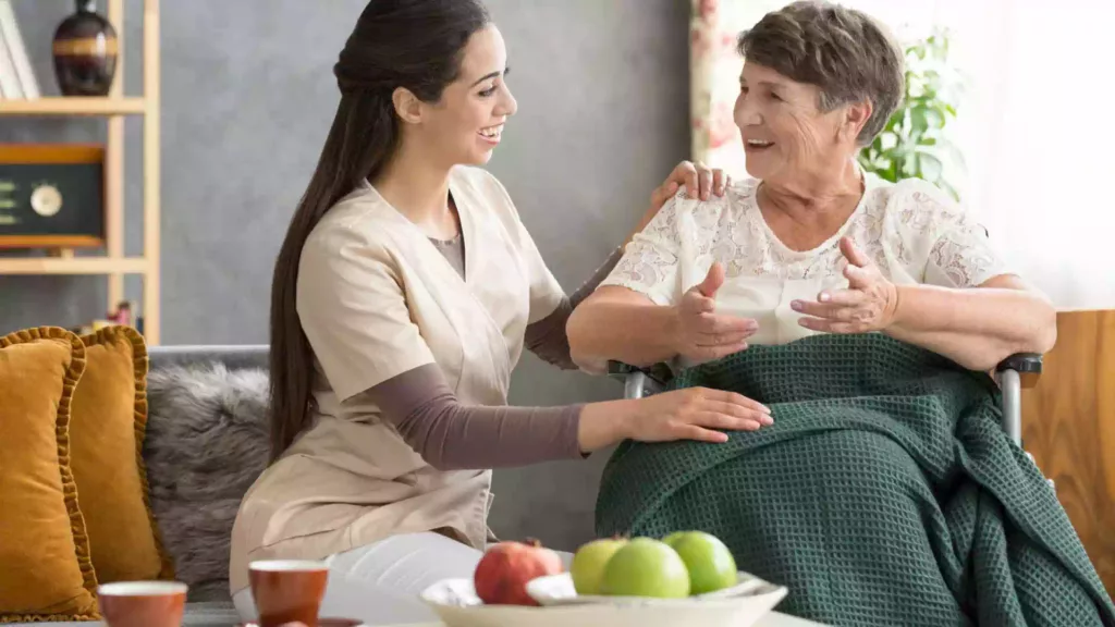 Happy senior woman and caregiver Alternative Therapy